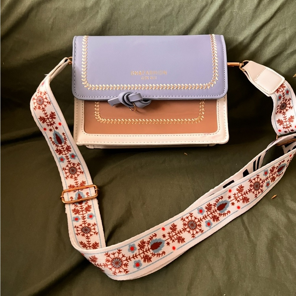 Elegant Blue and Tan Crossbody Bag with Structured Design. Stylish strap. NWOT
